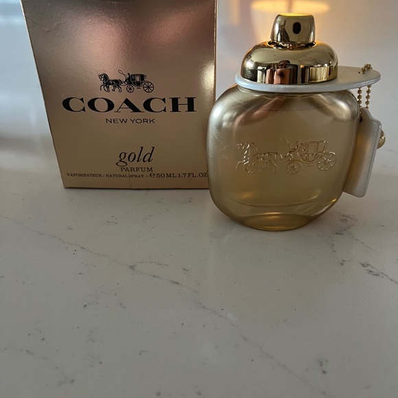 Coach Gold Parfum with Elegant Design